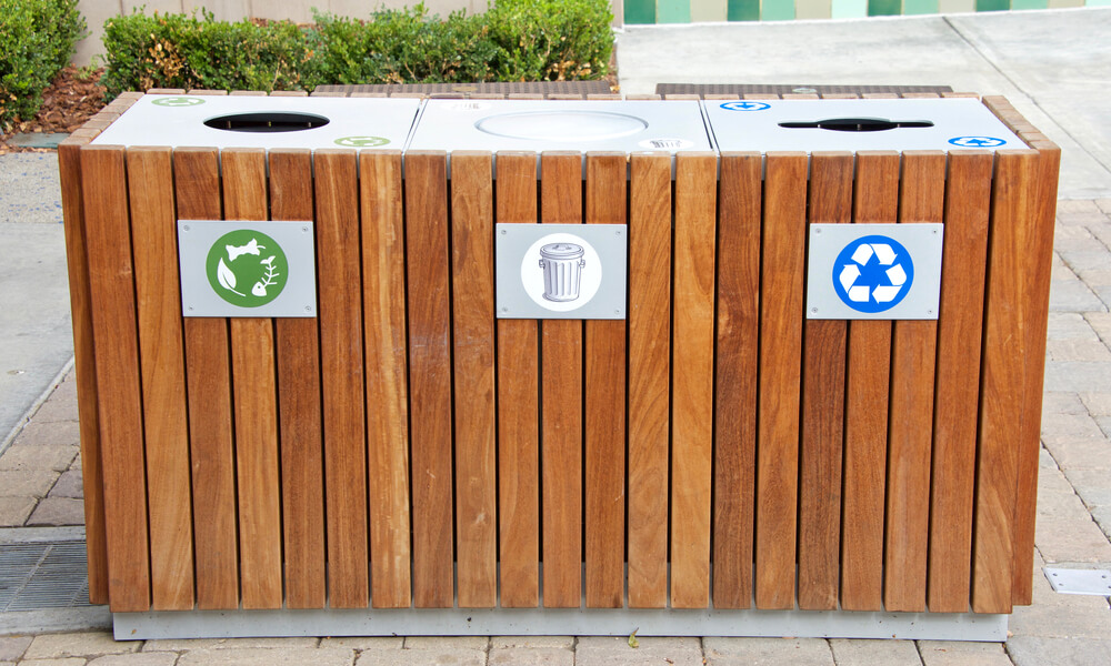 Composting, recycling and regular trash triple set up.